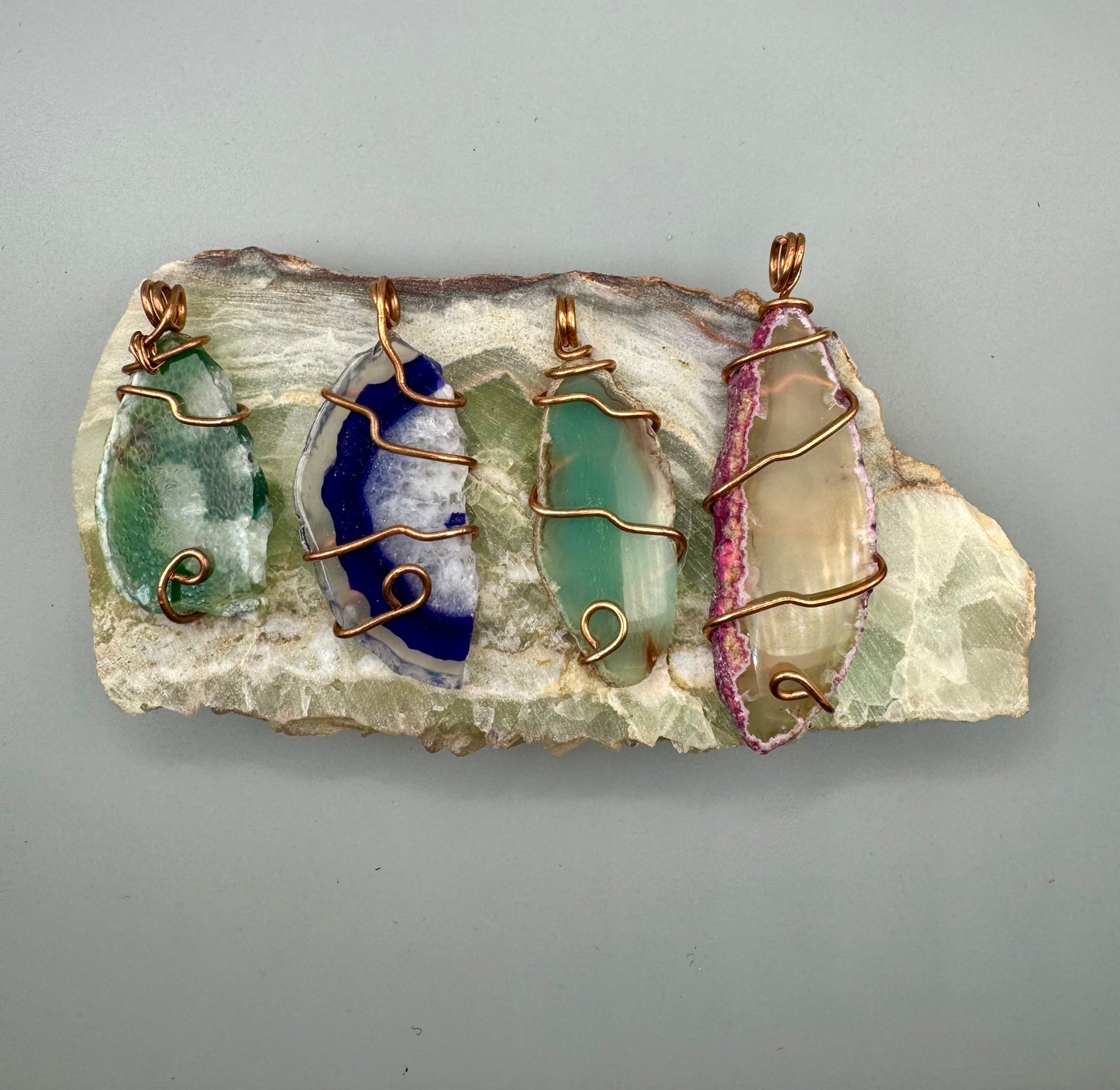 Copper wrapped agate pendents